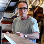 “We are creating heirlooms,” Daryl Evans said of his work at Masterpiece Woodworks in Avon.