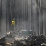 A firefighter on Monday surveyed a campground that was destroyed by the Rim Fire near Yosemite National Park.