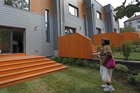 Lilly Boyd checked out one of the four ultra energy-efficient homes completed in her neighborhood near Dudley Square.
