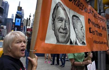 Sharon Pavlovich chanted with other opponents of US military action in Syria at New York's Times Square on Saturday. 
