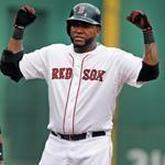 David Ortiz flexes his muscles after a two-run double capped a four-run second inning.
