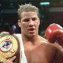 Tommy Morrison received his championship belt after defeating George Foreman in 1993. 