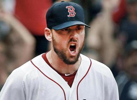 John Lackey is not pleased after giving up the first run of the game in the seventh inning (on an Andy Dirks triple).
