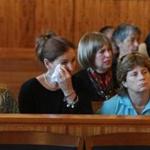 About a dozen relatives of Gayle Botelho listened to court proceedings Monday in the arraignment of Daniel T. Tavares Jr.