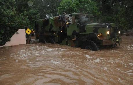 National Guardsmen were working with local agencies to evacuate people.
