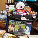 A bucket full of candy and other goodies awaits fans (like this youngster) who stay at the baseball suite at Hotel Commonwealth.