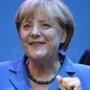 German Labor Minister Ursula von der Leyen, left, and Chancellor Angela Merkel celebrated after first exit polls. 