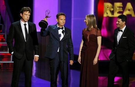 Producer Mark Burnett held up the award for Outstanding Reality-Competition Program for his show 