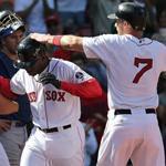 Jackie Bradley Jr. (middle) is greeted at home plate by Ryan Lavarnway (left) and Stephen Drew following his three-run homer.