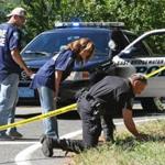 Investigators looked for evidence at the intersection of Summer and Thatcher streets in East Bridgewater.