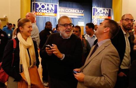 John Connolly supporters Deanna Palmini, Ken Tutunji, and Paul Duffy watched returns.
