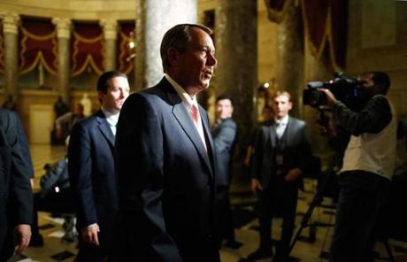 House Speaker John Boehner walked to the House to vote on a budget bill Monday night.
