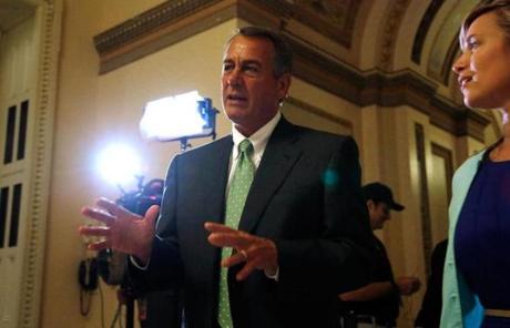 House Speaker John Boehner departed the House floor after votes on measures to open portions of the government. 
