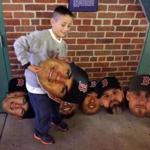 C.J. Olivolo, 9, of Hilton Head, S.C., chose a favorite player’s face to hold for a photographic “portrait.”