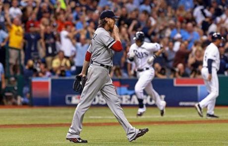 Clay Buchholz reacted as Evan Longoria headed for home after hitting a three-run home run in the fifth inning.

