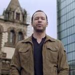 Donnie Wahlberg standing in Copley Square in the new FiOS commercial.