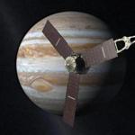 A 2010 artist's rendering depicts NASA's Juno spacecraft with Jupiter in the background.
