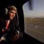 Secretary of State John Kerry aboard a helicopter after arriving for an unannounced visit in Kabu on Friday.