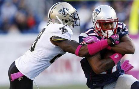 Saints cornerback Keenan Lewis tackled Aaron Dobson in the first quarter.
