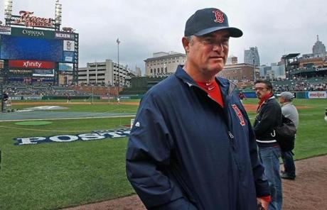  Red Sox manager John Farrell walked off the field during Boston's batting practice at Comerica Park in Detroit.
