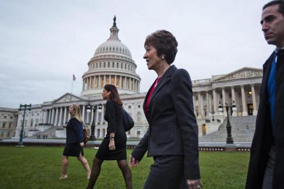 Republican Senators Kelly Ayotte (second from left) and Susan Collins (second from right) walked in front of the US Capitol early Wednesday.