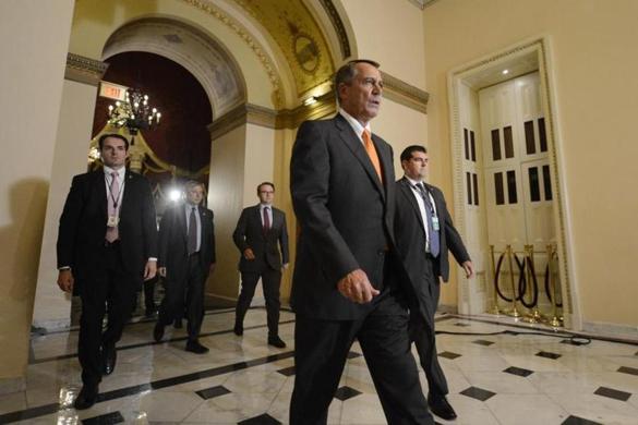 US House Speaker John Boehner walked to the House floor.