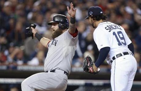 Anibal Sanchez (right) could only watch as Mike Napoli scored from third base on a wild pitch.
