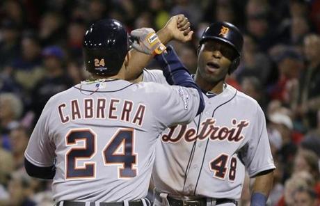Miguel Cabrera (left) and Torii Hunter celebrated after they scored against the Red Sox.
