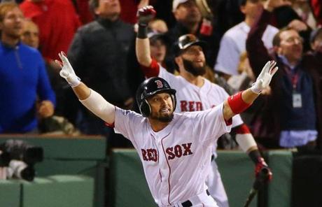 Victorino celebrated his grand slam as he headed to first base.
