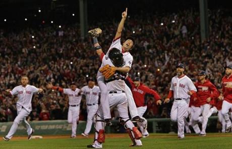 Koji Uehara and Jarrod Saltalamacchia celebrated closing out the win and advancing to the World Series.
