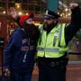 Martha Hicks-Robinson of Montpelier, Vt., posed with Boston police officer Steve Horgan outside Fenway Park before the start of Game 1 of the World Series. 