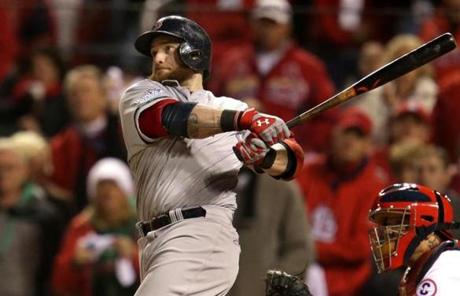 Jonny Gomes hit a three-run homer in the sixth inning, giving the Red Sox a 4-1 lead.
