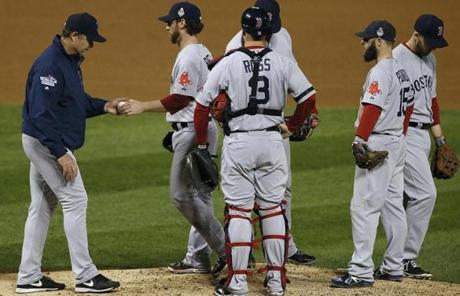 Red Sox manager John Farrell pulled Craig Breslow out of the game in the seventh inning.
