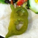 A 27-year-old Somerville woman found a pepper in the shape of the Red Sox “B” logo in a taco she was eating.