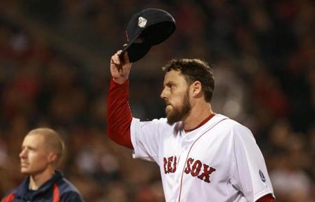 John Lackey tipped his cap as he left in the seventh inning.
