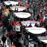 A long line of Duck Boats carried members of the Red Sox after the team’s victory in 2004.