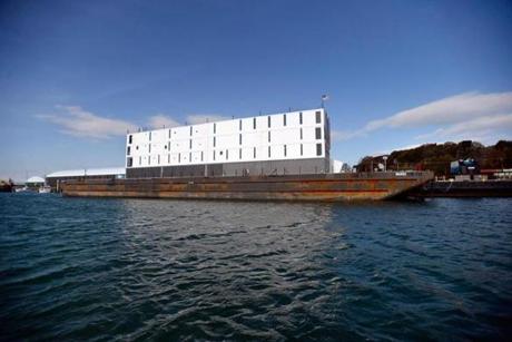 An unusual structure on a barge in Portland Harbor has had people buzzing.
