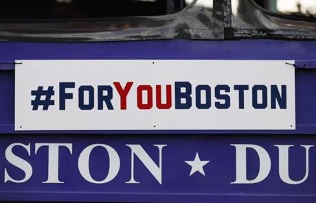 A sign hung on one of the Duck Boats participating in the parade.
