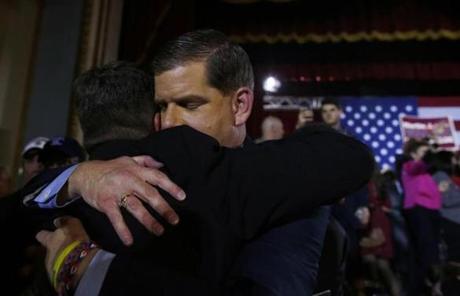 Walsh hugged a supporter at his election night party at  Boston Park Plaza Hotel.
