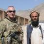 Jack Hammond, retired Army brigadier general, with a village elder in Kabul province in Afghanistan in 2011. says the Marathon bombing left him with sleepless nights.