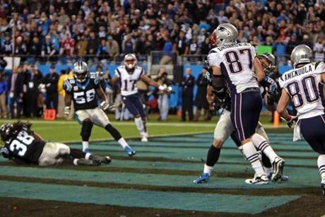 Panther Robert Lester (38) intercepted Tom Brady’s pass intended for Rob Gronkowski, who was wrapped up by Luke Kuechly. A flag was thrown, but it was picked up, ending the game.
