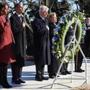 President Obama, Michelle Obama, former president Bill Clinton, and former secretary of state Hillary Clinton took part in a wreath-laying ceremony at John F. Kennedy's gravesite at the Arlington National Cemetery.