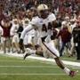 Andre Williams ran for 263 yards, becoming the first BC player to rush for 2,000 in a year.