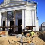 Workers prepared North Prospect Church on Massachusetts Avenue for relocation to accommodate new construction.