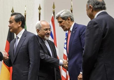 Iranian Foreign Minister Mohammad Javad Zarif shook hands with Secretary of State John Kerry next to Chinese Foreign Minister Wang Yi, left,  and French Foreign Minister Laurent Fabius, right.
