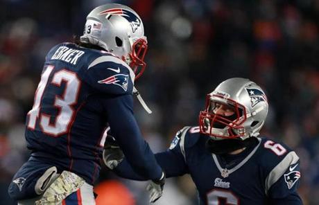 Nate Ebner (left) leaped in celebration after he recovered the punt that went off of Carter (not pictured).
