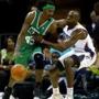 Gerald Wallace handled the ball against Anthony Tolliver of the Bobcats.