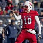 Natick quarterback Troy Flutie set the state record for touchdown passes in a season (47) .