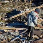 Brady Klein, 11, searched the rubble of his family’s home.