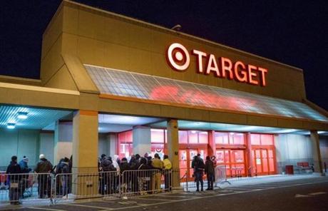 Shoppers waited in line outside the Target store in Somerville early Friday. Doors opened at 1 a.m. 
